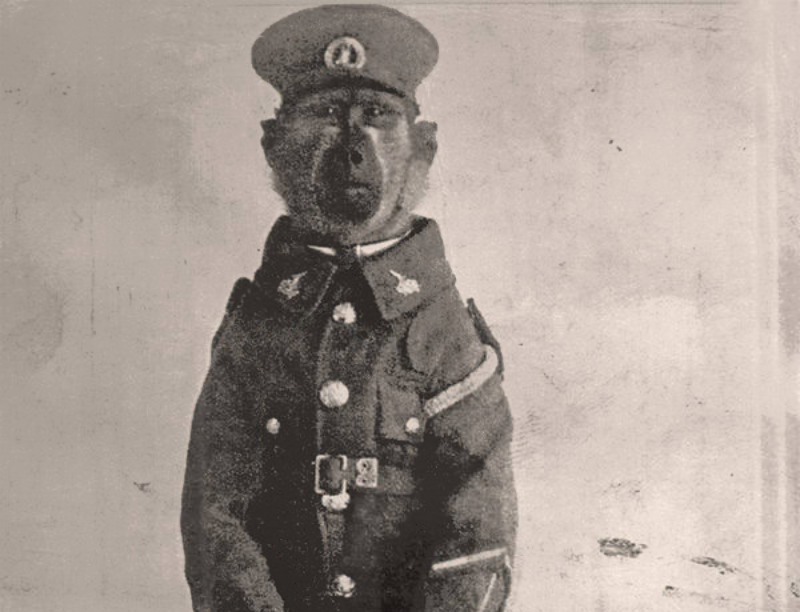 Corporal Jackie poses for a portrait in his official uniform