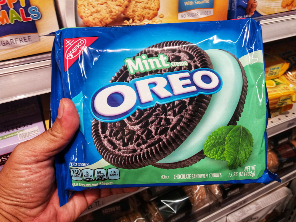 Hand hold a packet of Oreo Mint creme at the supermarket