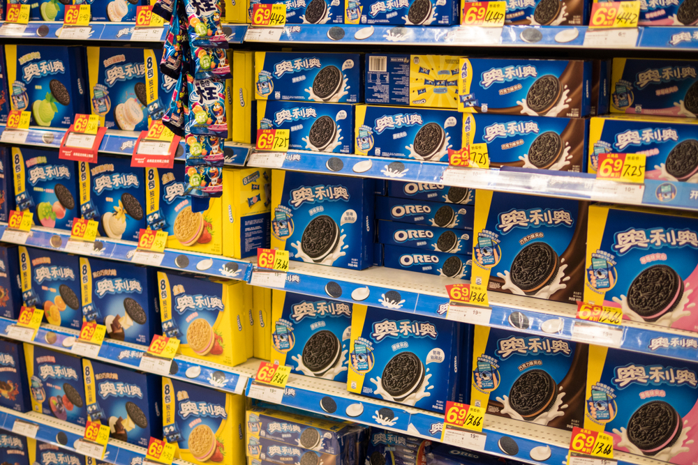 Oreo cookies for sale stand on a shelf in a shop in China