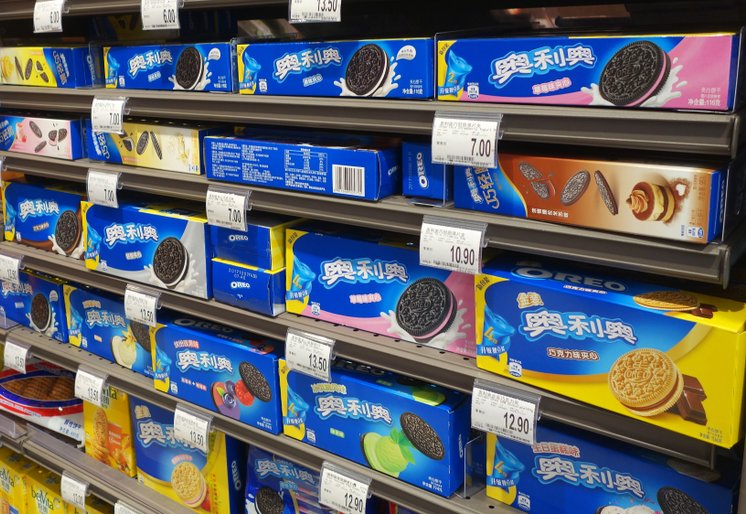 Oreo cookies for sale stand on a shelf in a shop in China
