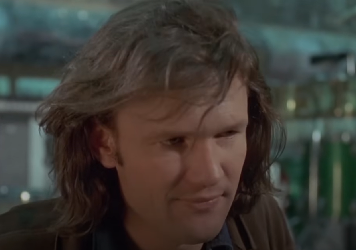 Screenshot of Kris Kristofferson looking at side from - Cisco Pike (1971)