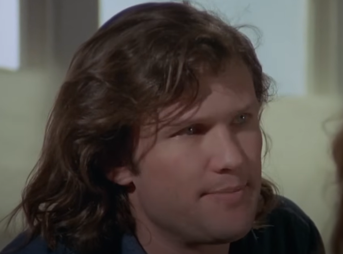 Screenshot of Kris Kristofferson looking at side from - Cisco Pike (1971)