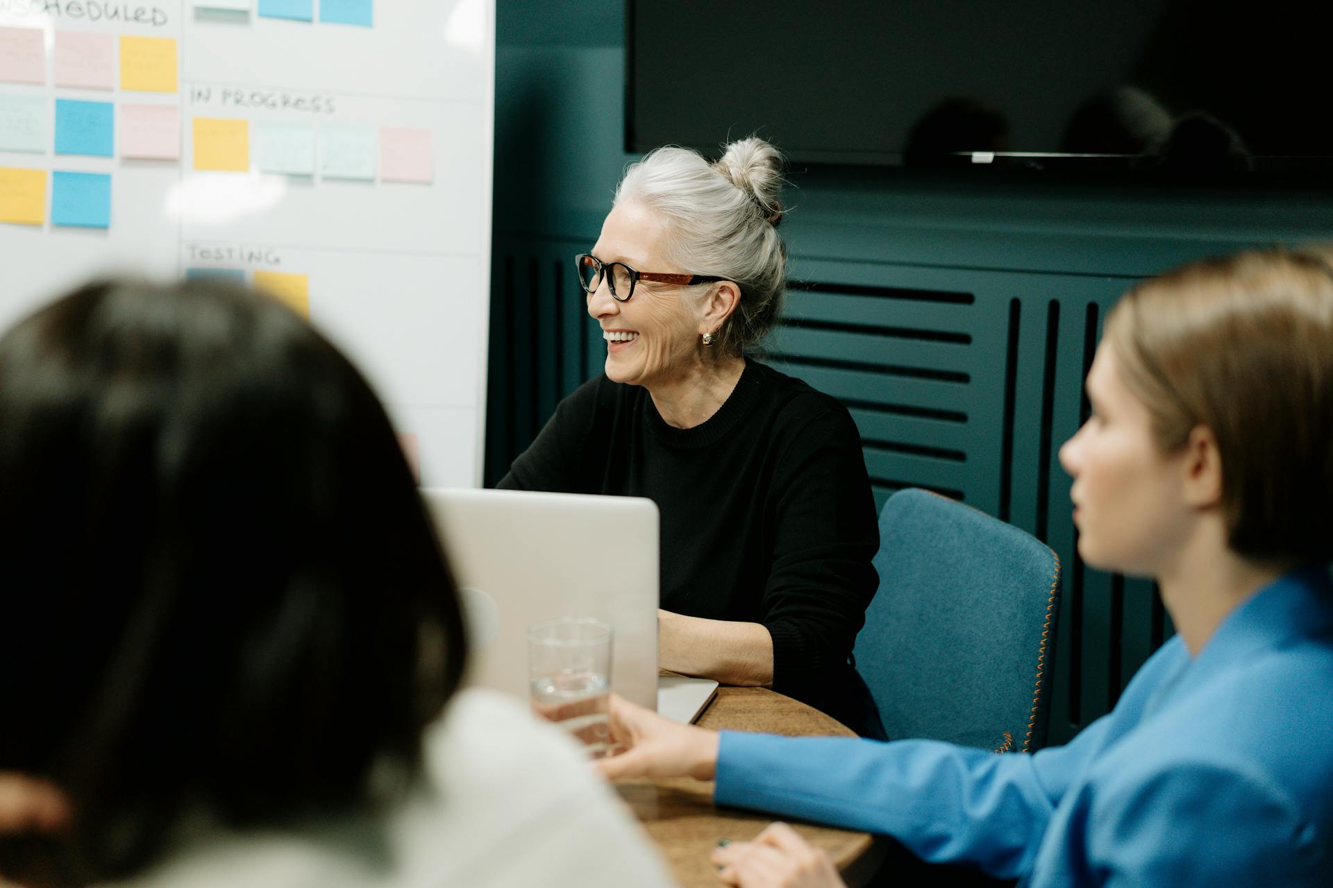 Woman in black sweater and Gray Hair