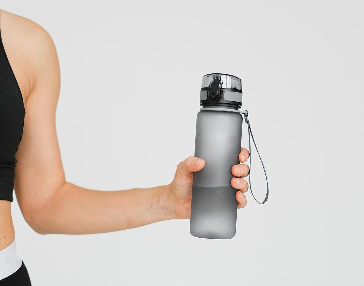 Woman athlete in sports clothing