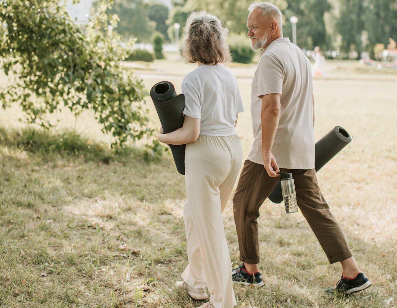 An elderly couple walking together