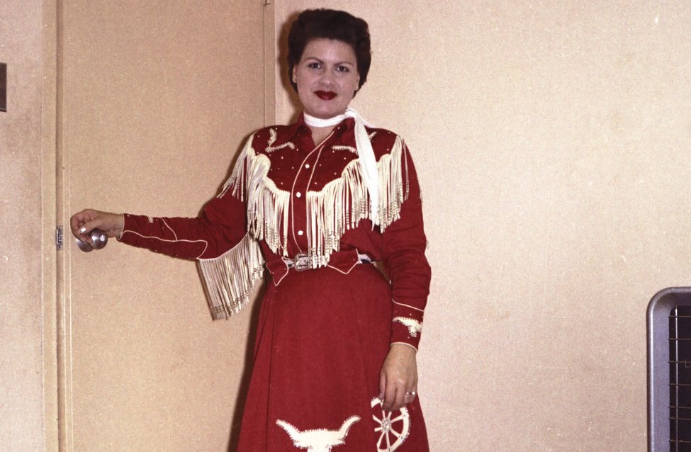 Country Singer Patsy Cline wearing a red outfit