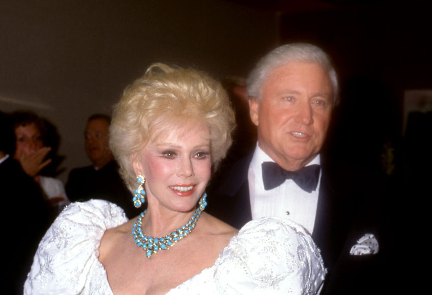Eva Gabor in white And Merv Griffin in a suit