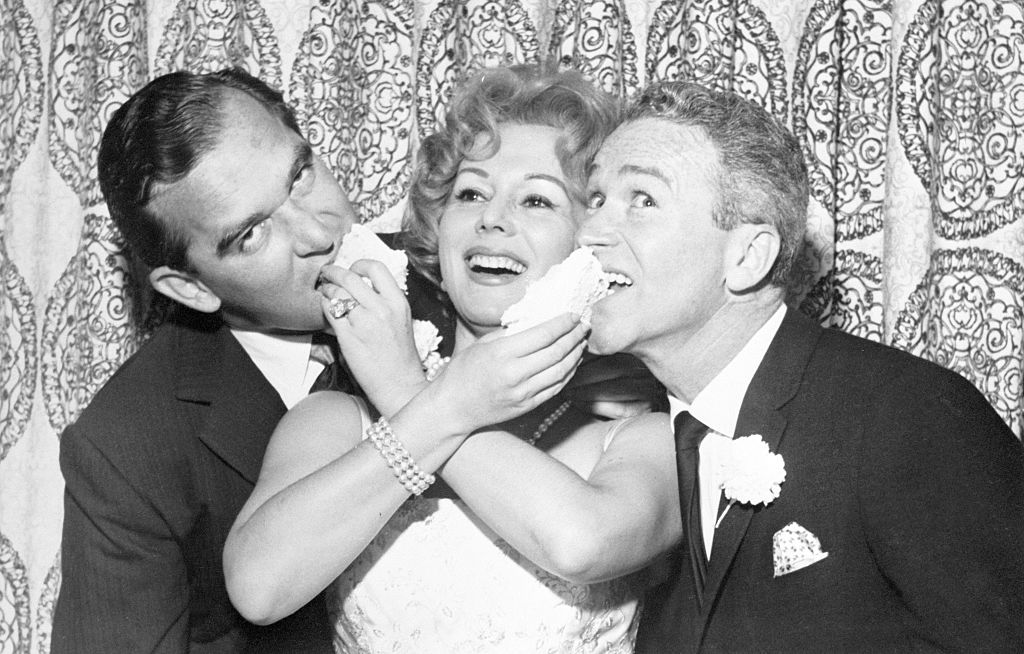 Eva Gabor Feeding Richard Brown and Red Buttons Cake