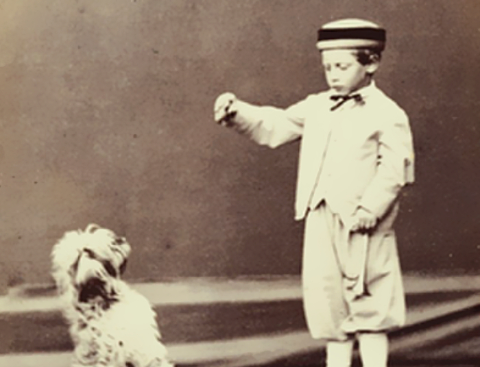 Wilhelm II as a boy in white outfit