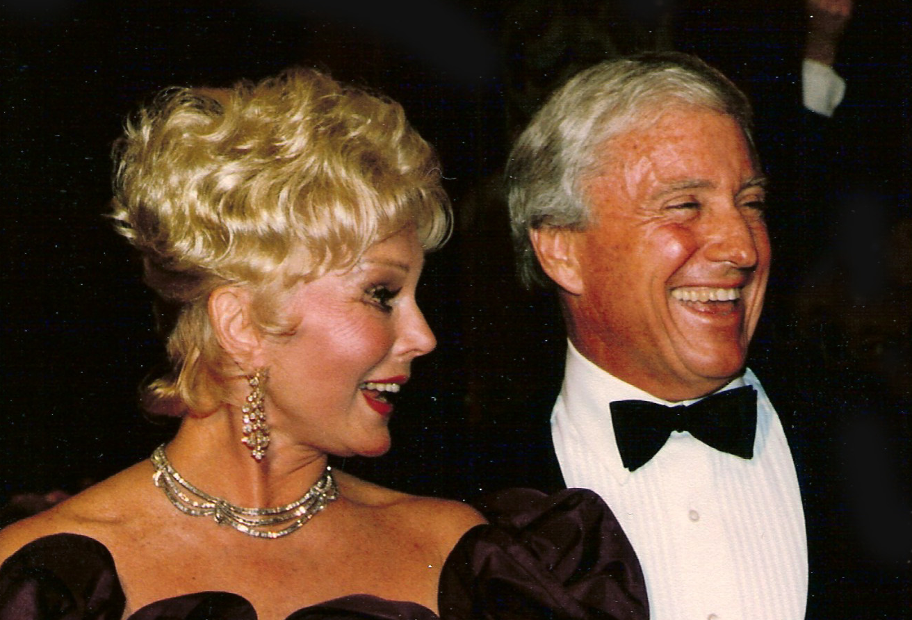 Eva Gabor & Merv Griffin attending an event