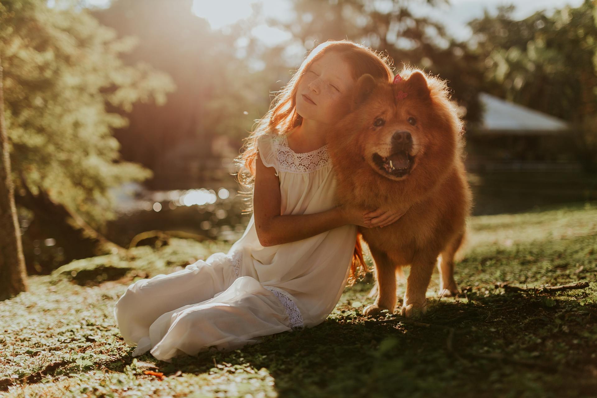 Girl in white and her dog
