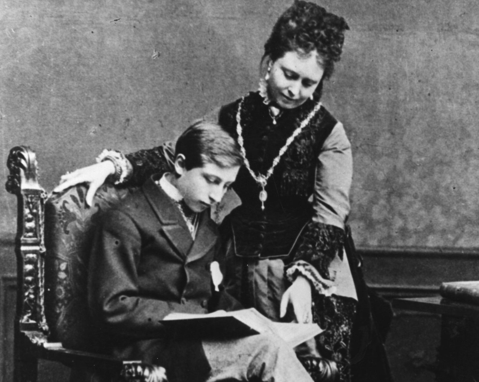 Wilhelm II in the 1870s reading a book