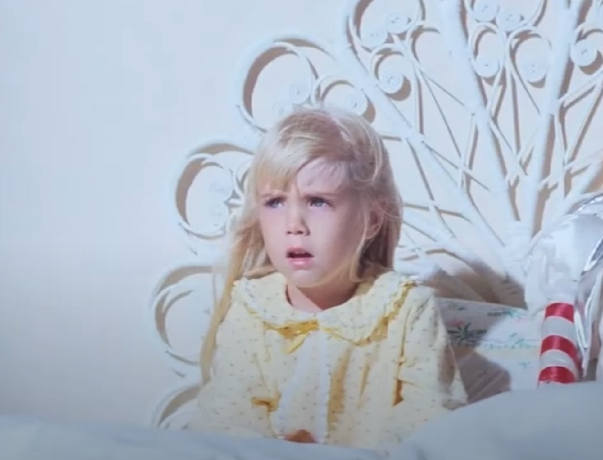 Screenshot of Heather O'Rourke looking sad - from Poltergeist (1982)