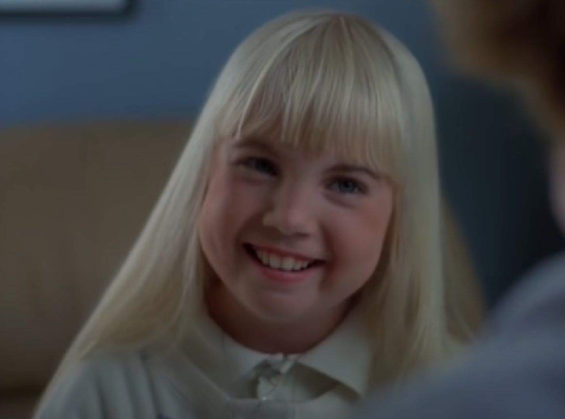 Screenshot of Heather O'Rourke smiling from - Poltergeist III (1998)