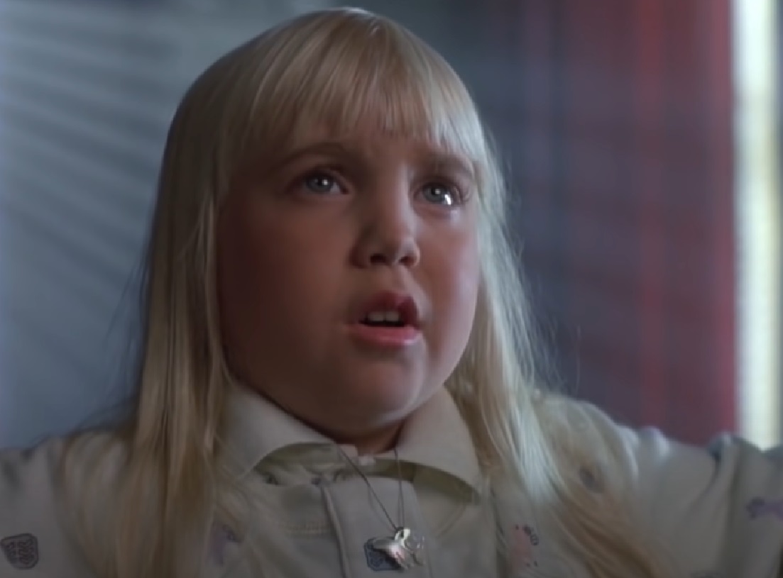 Screenshot of Heather O'Rourke looking upset from - Poltergeist III (1998)