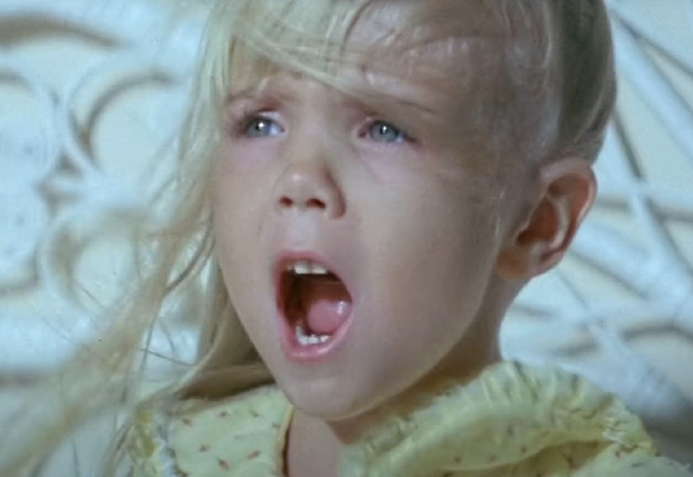 Screenshot of Heather O'Rourke screaming - from Poltergeist (1982)