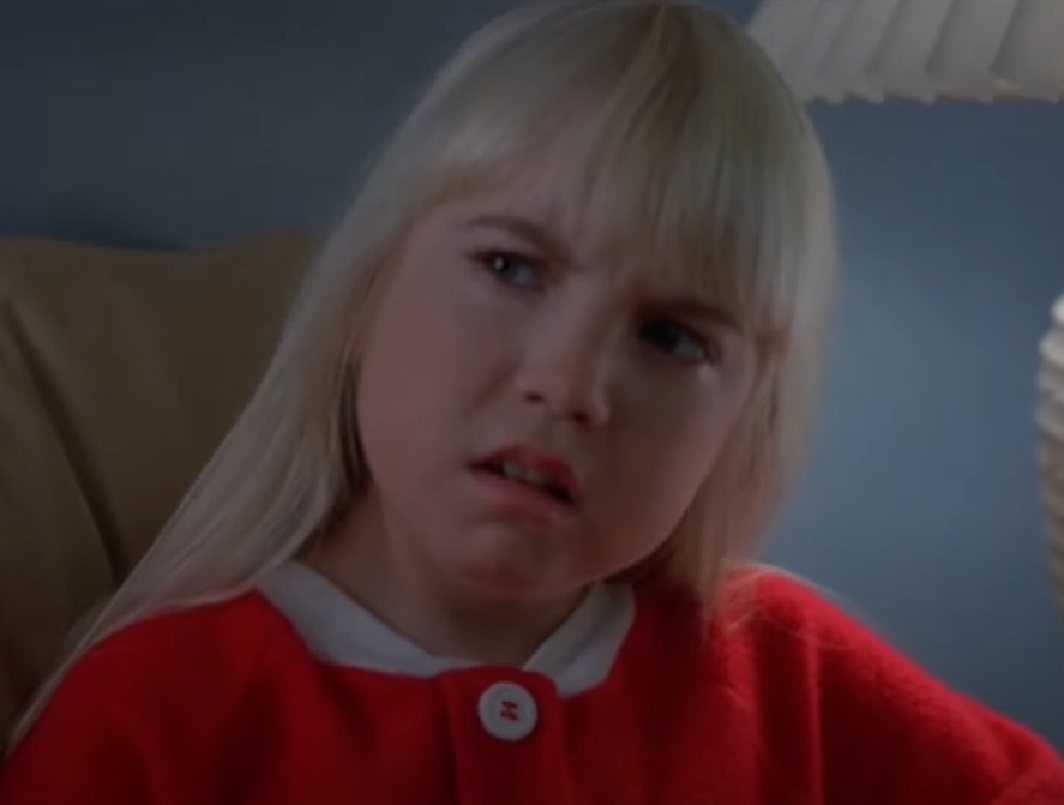 Screenshot of Heather O'Rourke looking upset from - Poltergeist III (1998)
