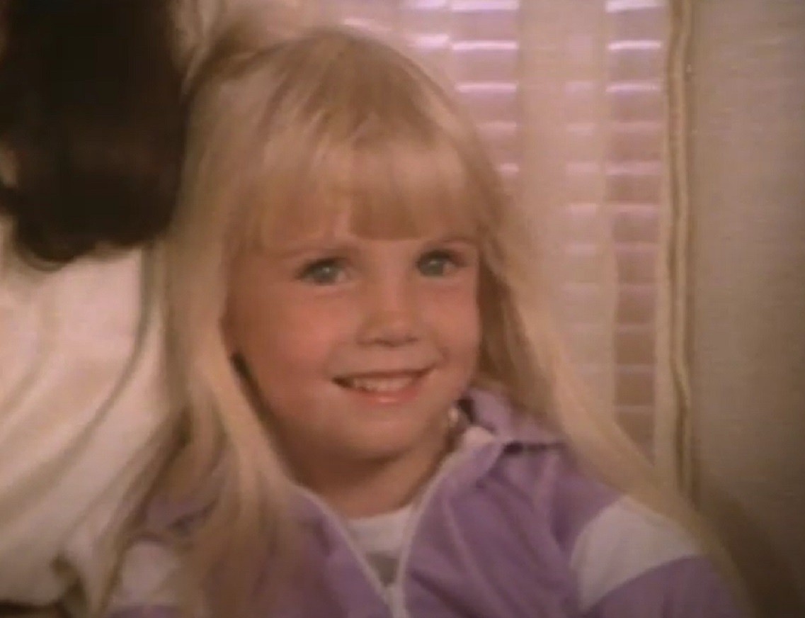 Screenshot of Heather O'Rourke smiling from - Poltergeist (1982)