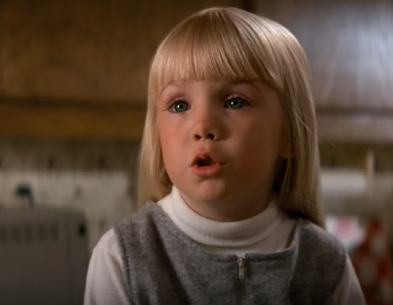 Screenshot of Heather O'Rourke looking at side from - Poltergeist (1982)