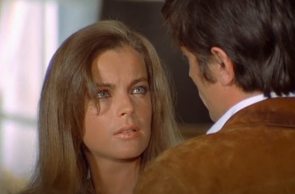 Screenshot of the movie The Swimming Pool (1969) showing Alain Delon and Romy Schneider