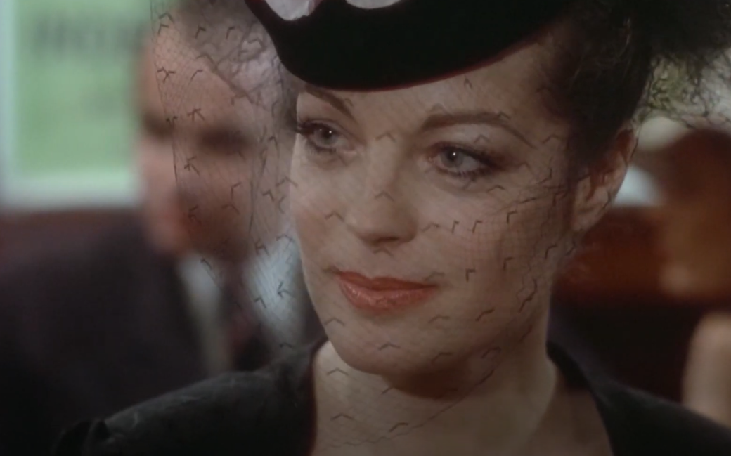 Screenshot of the movie The Old Gun (1975) showing Romy Schneider as Clara Dandieu