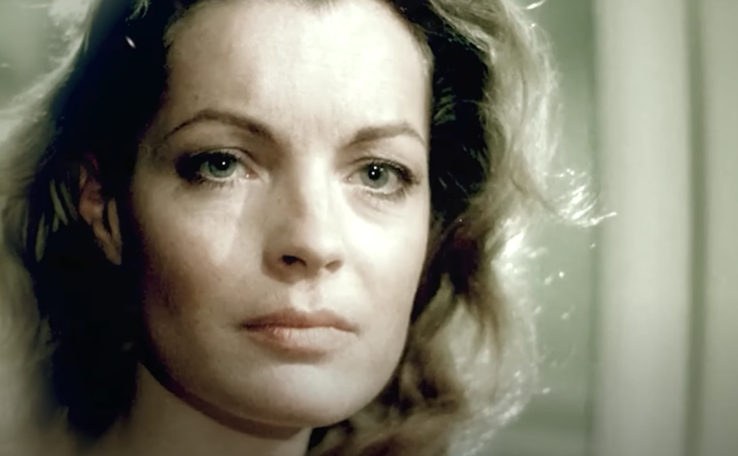 Screenshot of the movie The Old Gun (1975) showing Romy Schneider as Clara Dandieu