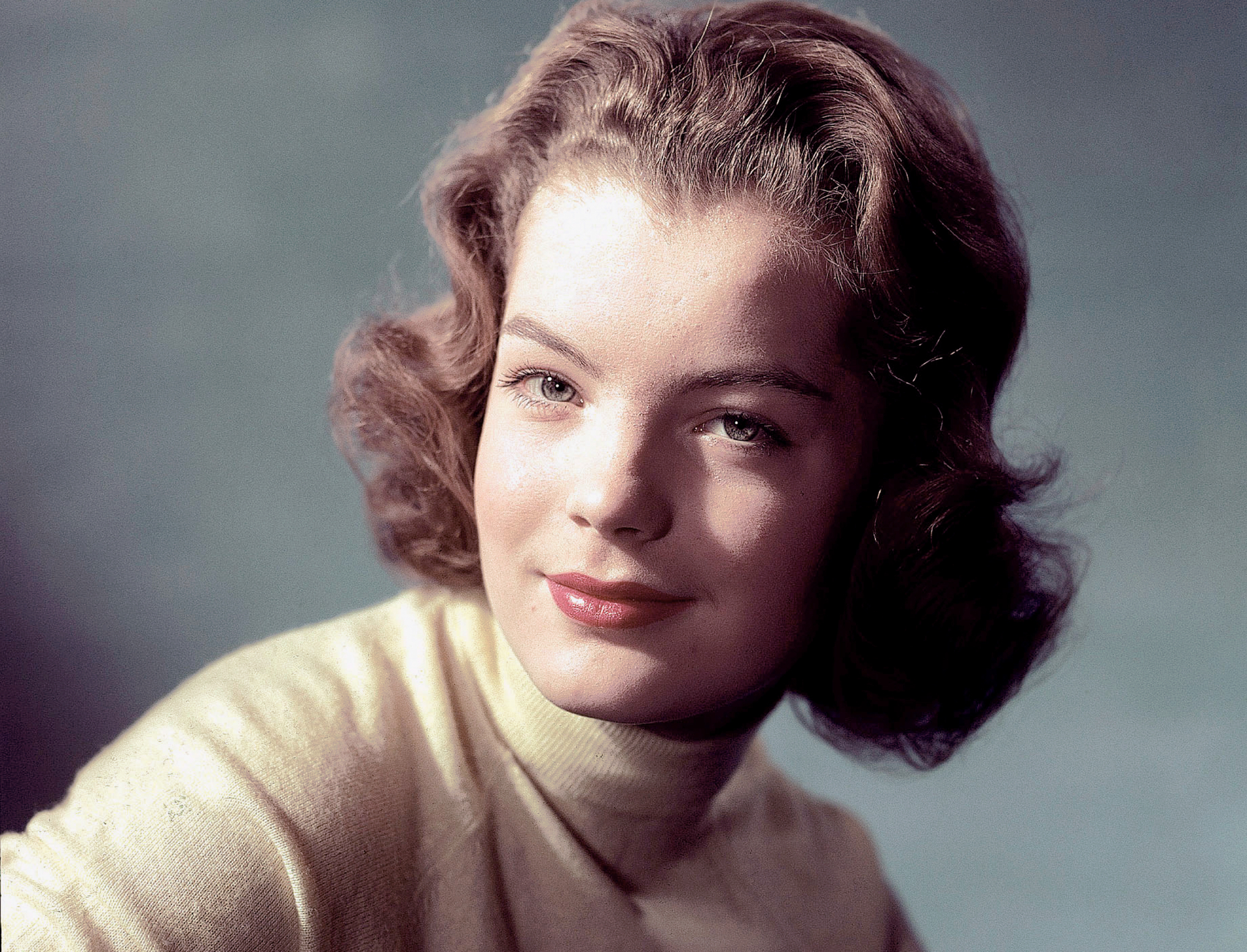 Austrian-born German actress Romy Schneider in yellow top