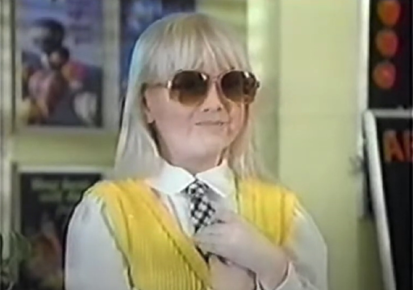 Screenshot of Heather O'Rourke with glasses smiling - from Our House (American TV series 1986-88)