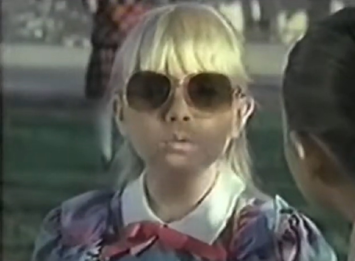 Screenshot of Heather O'Rourke with glasses - from Our House (American TV series 1986-88)