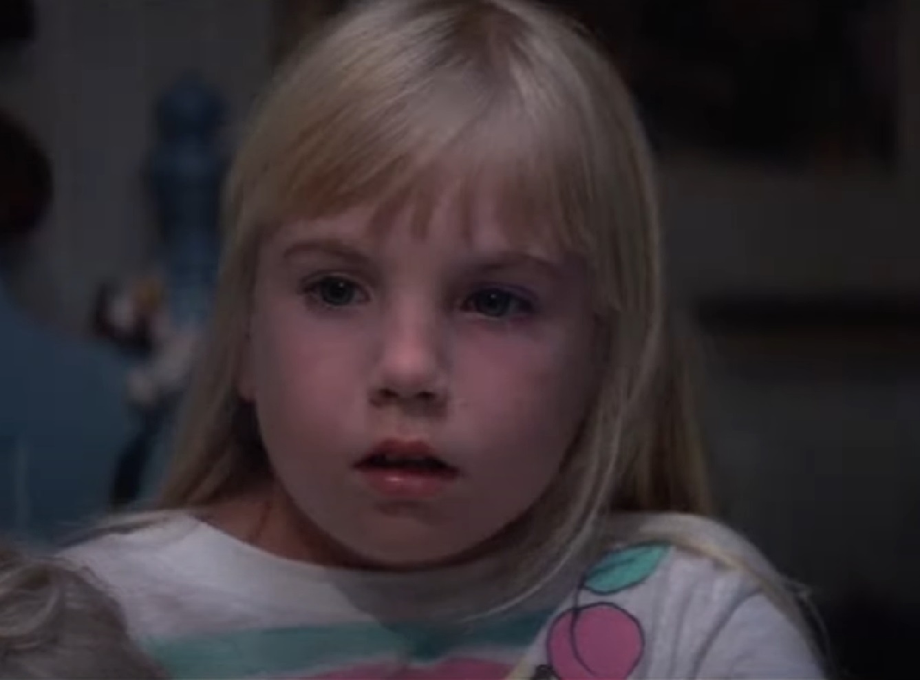 Screenshot of Heather O'Rourke looking sad - from Poltergeist II - The Other Side (1986)