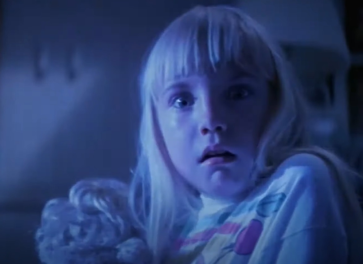 Screenshot of Heather O'Rourke looking scared from - Poltergeist II: The Other Side (1986)