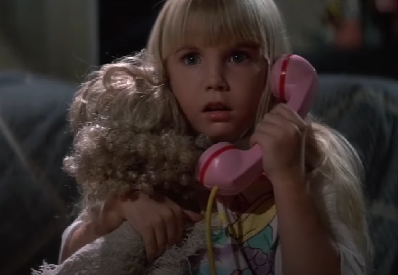 Screenshot of Heather O'Rourke talking on telephone from - Poltergeist II: The Other Side (1986)