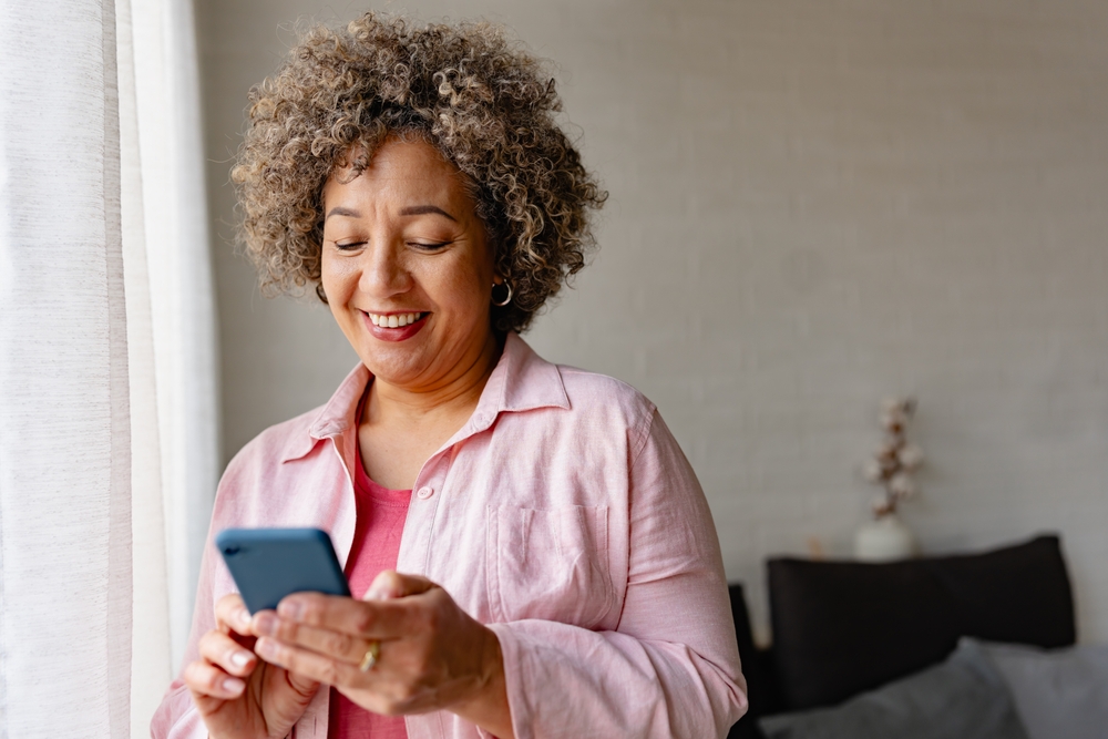 mature woman using smartphone