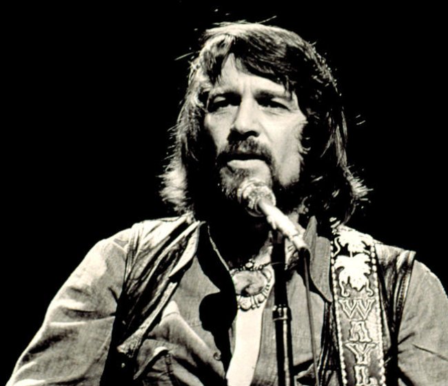 Waylon Jennings on stage 