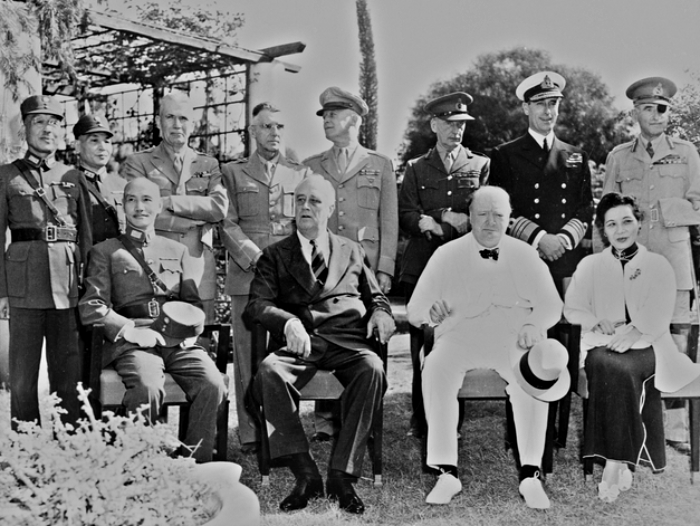 Outdoors group portrait of officers and military leaders