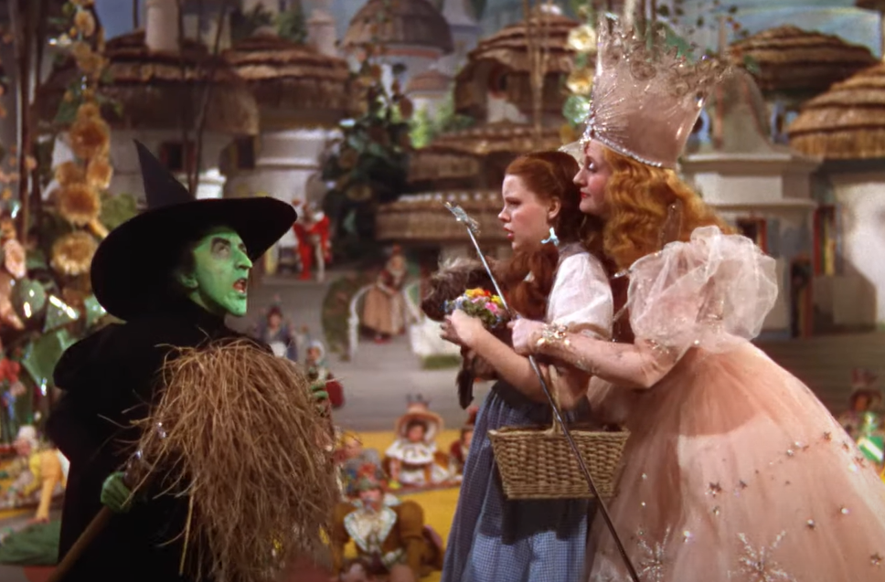 Judy Garland as Dorothy Gale, Billie Burke Glinda and Margaret Hamilton as  Miss Gulch, The Wicked Witch of the West