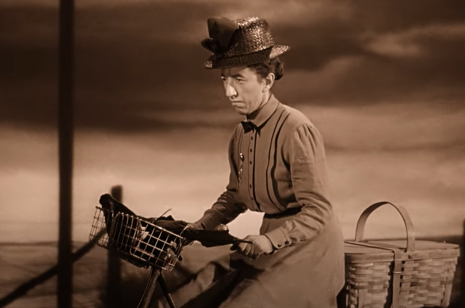 Margaret Hamilton as The Wicked Witch, Miss Gulch