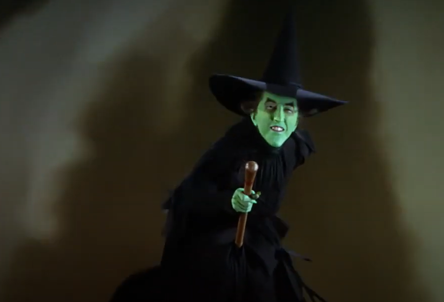 Margaret Hamilton as The Wicked Witch, Miss Gulch