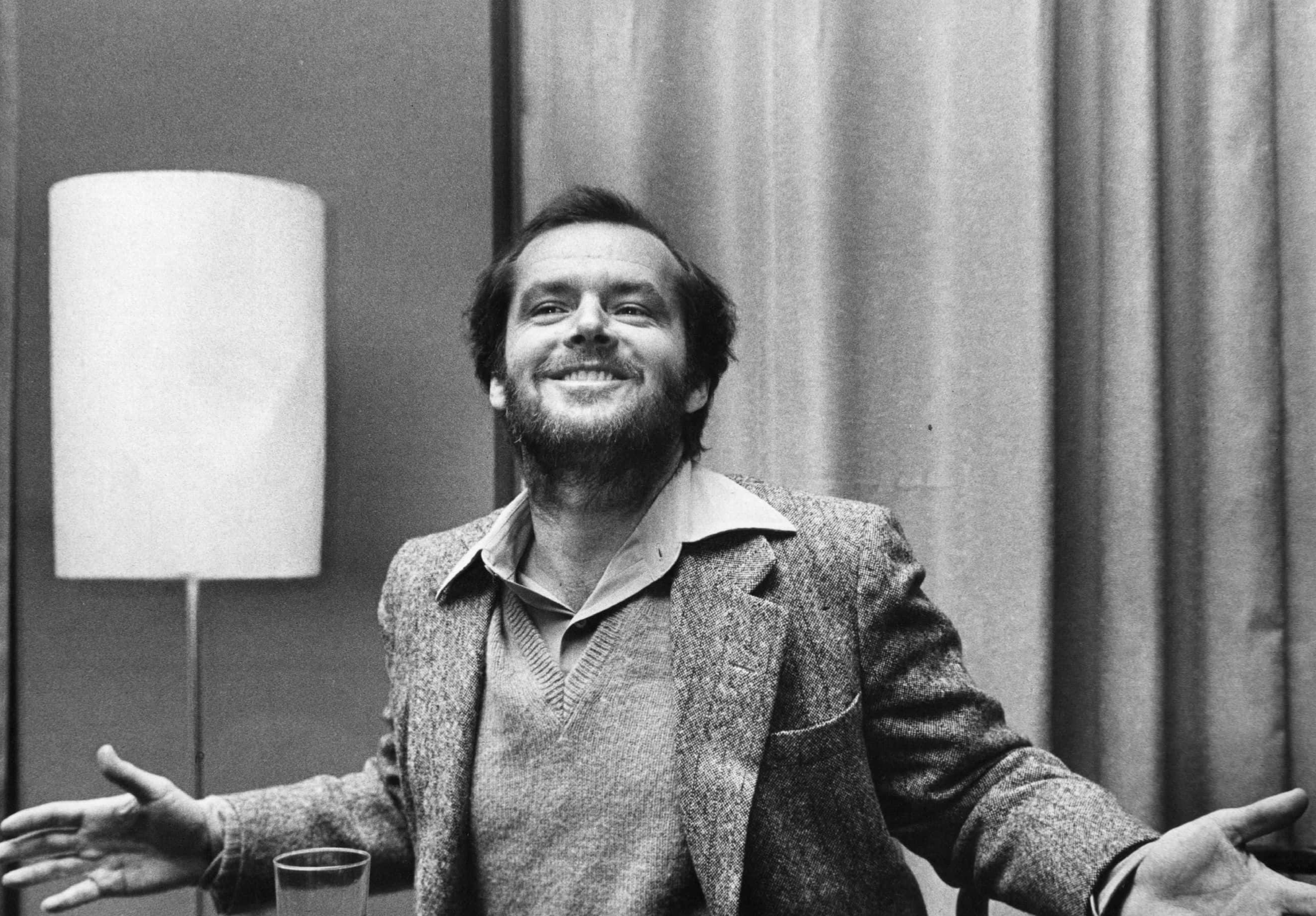 Jack Nicholson at an expressive moment ,making hand gestures and smiling - 1975