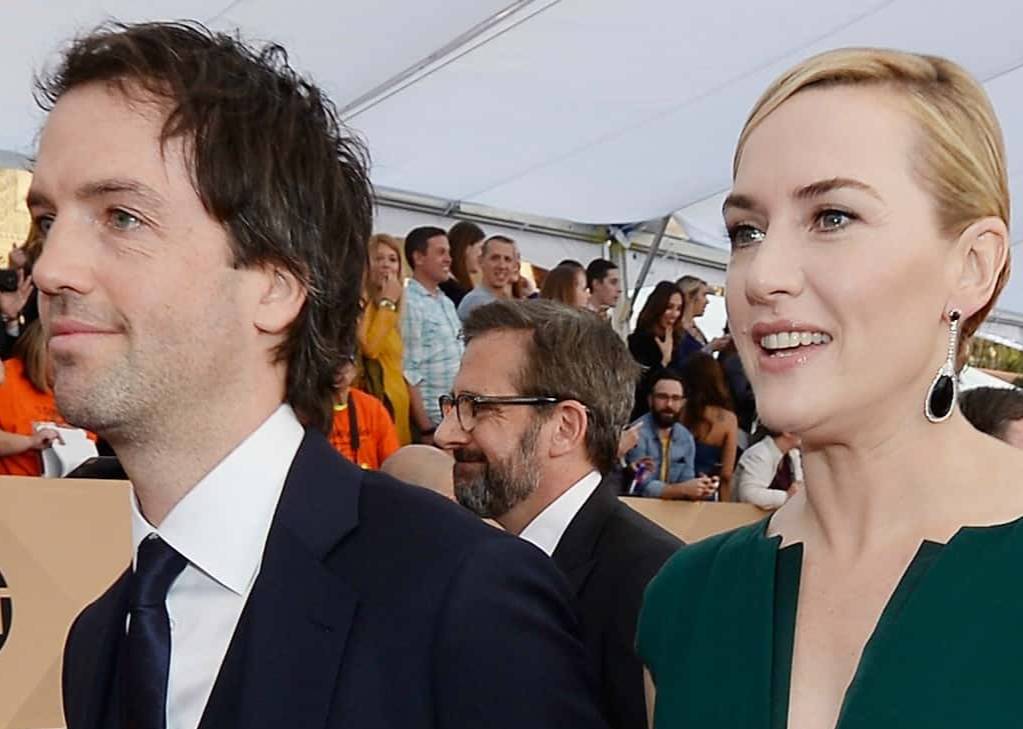 Actress Kate Winslet (R) and Ned Rocknroll attend the 22nd Annual Screen Actors Guild Awards