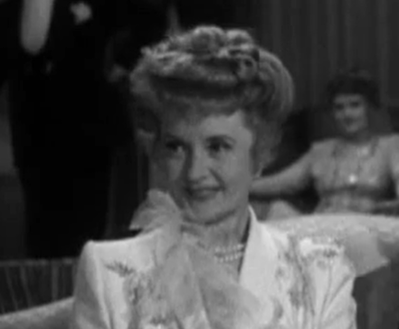 Screenshot of Billie Burke from Gildersleeve on Broadway (1943)
