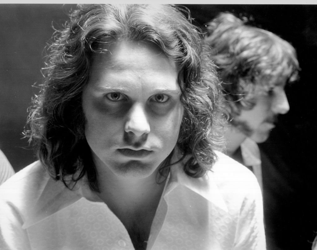 Jim Morrison in a white shirt