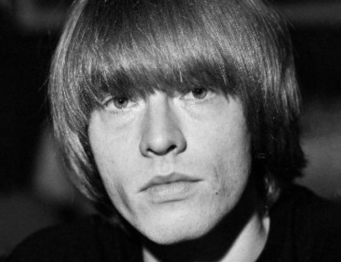 Photograph of Brian Jones in a black shirt