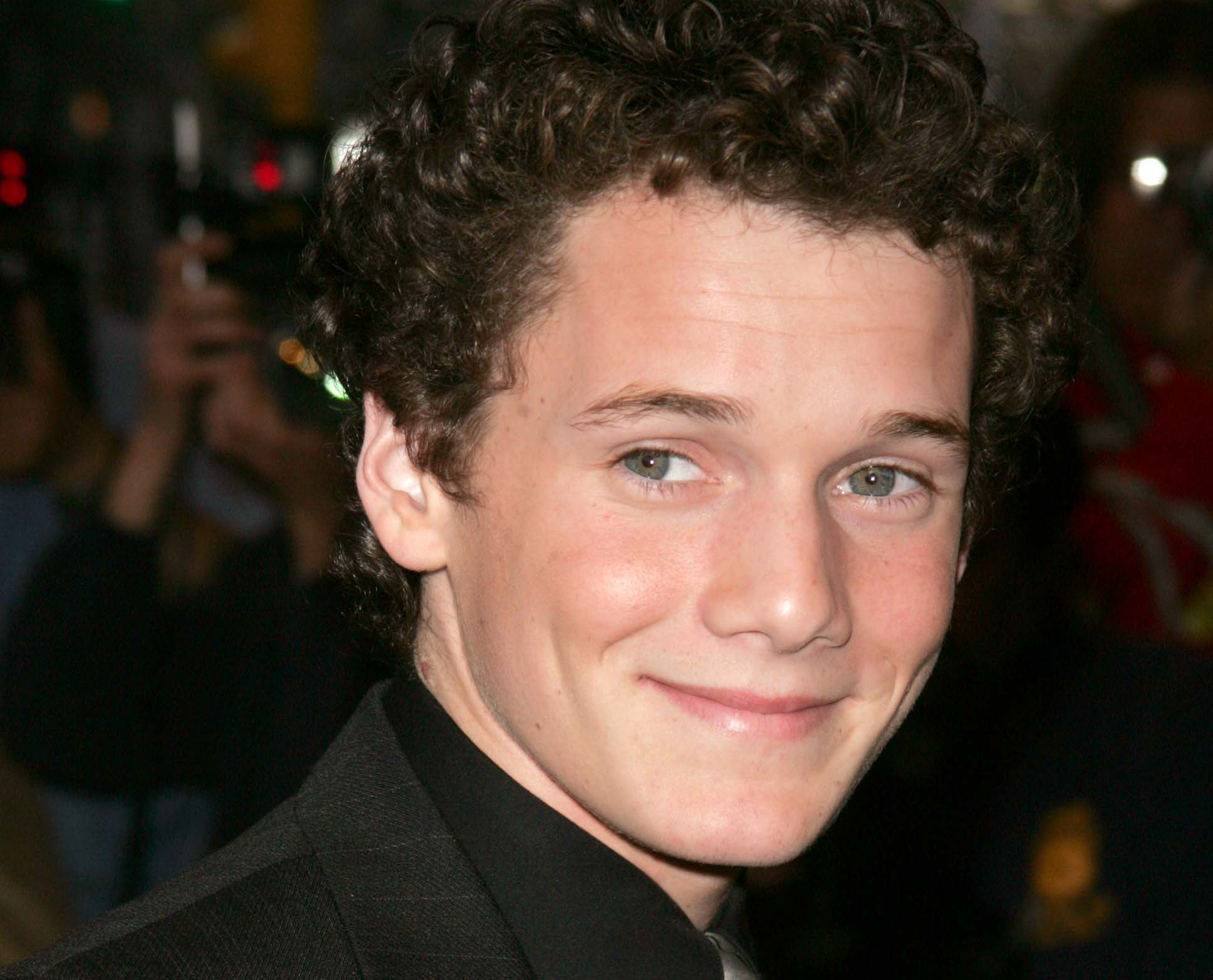 Anton Yelchin, young at a premiere  in black suit