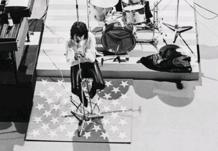 Jim Morrison performing with his band The Doors