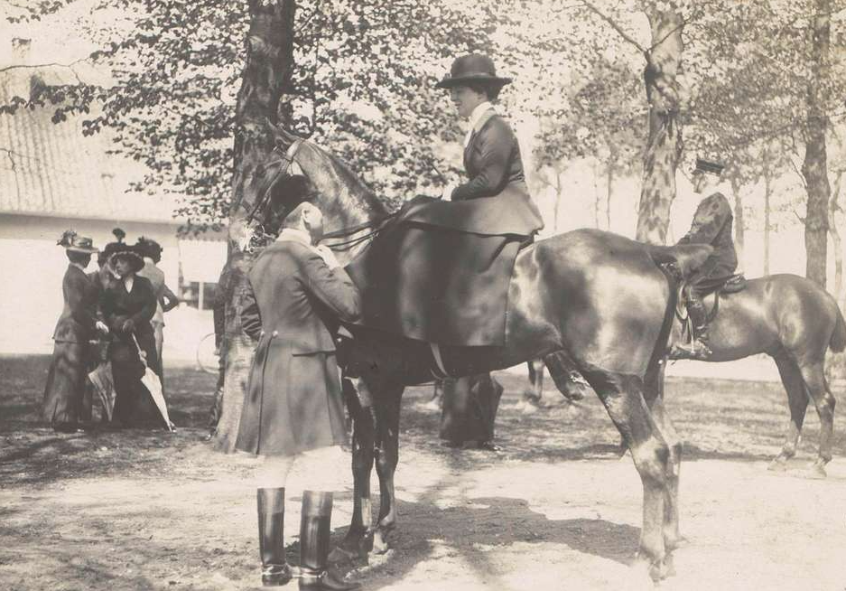 Victorian era woman on a horseback