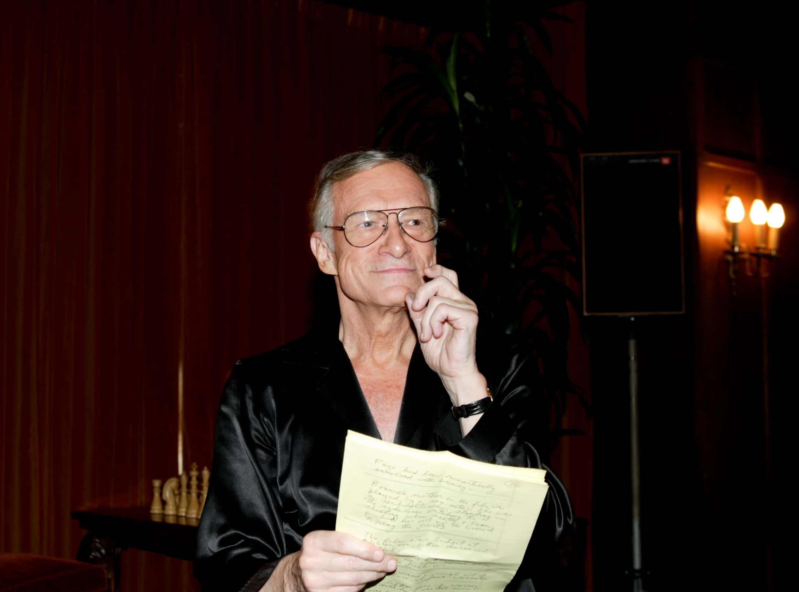 Hugh Hefner reads from his notes