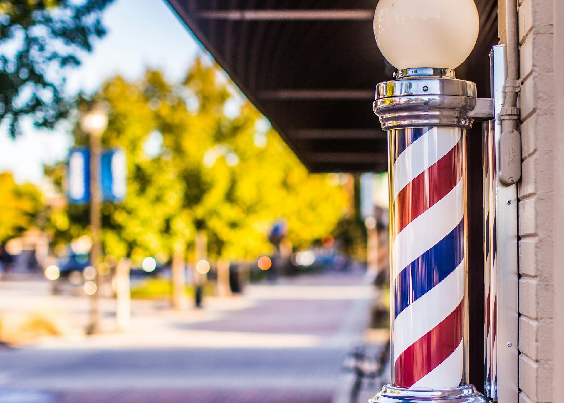 Shallow focus photo of a barber's pole