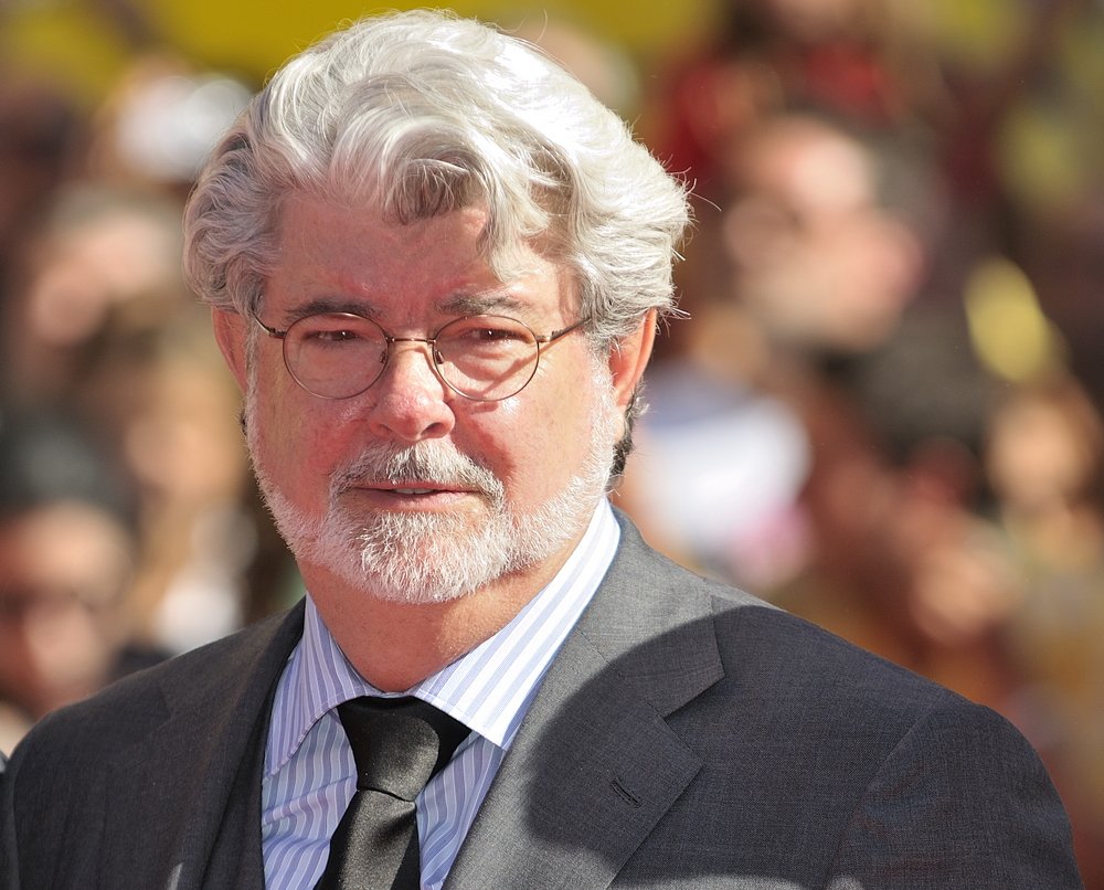 George Lucas wearing a grey suit