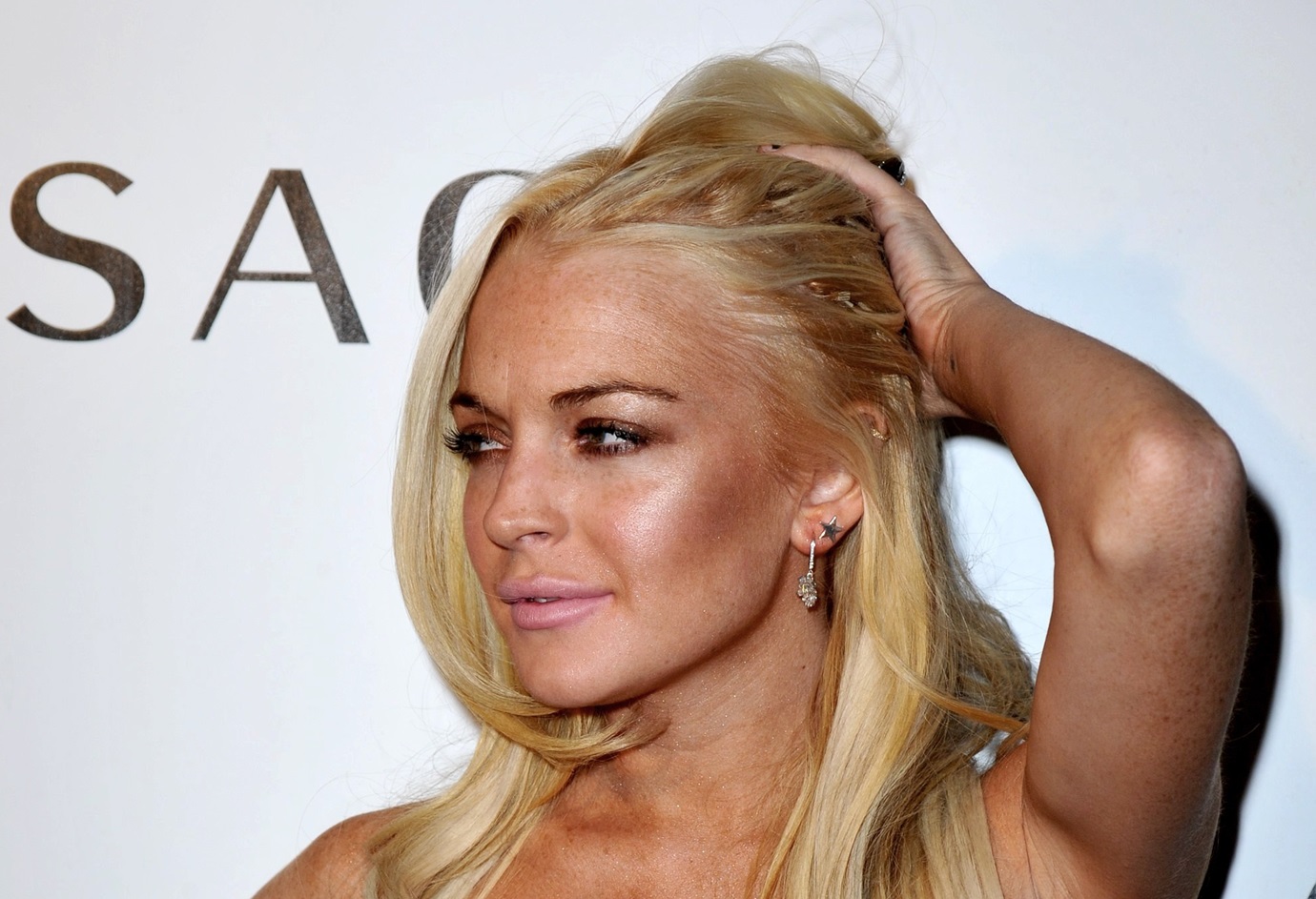 Lindsay Lohan, in a Versace dress, at The Whitney Museum of American Art Gala and Studio Party - 2009
